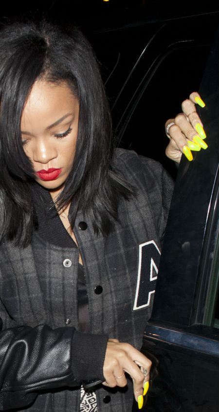 8215682_Yellow Rihanna nails clubbing in West Hollywood
