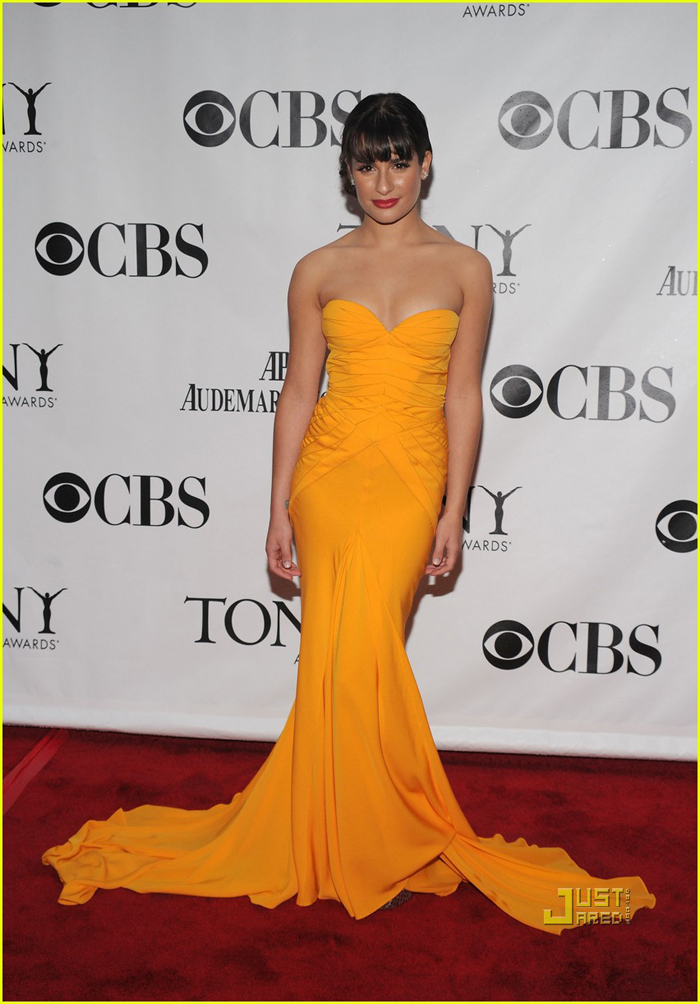 In mustard-yellow marmaid-style by Zac Posen